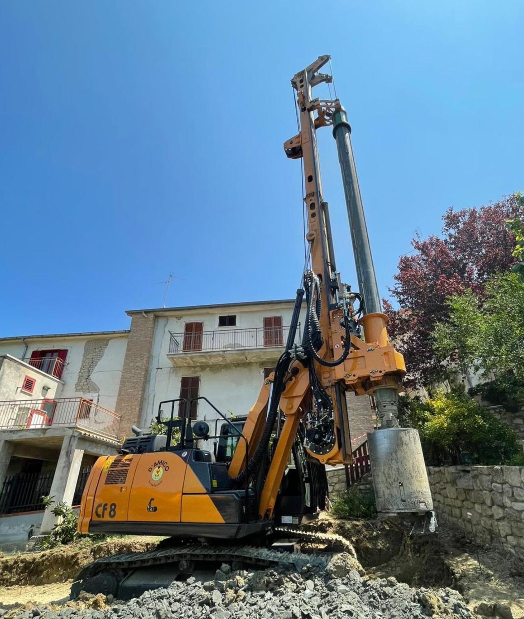 TesCar CF8 hydraulic piling rig with 2-section mast on a job site