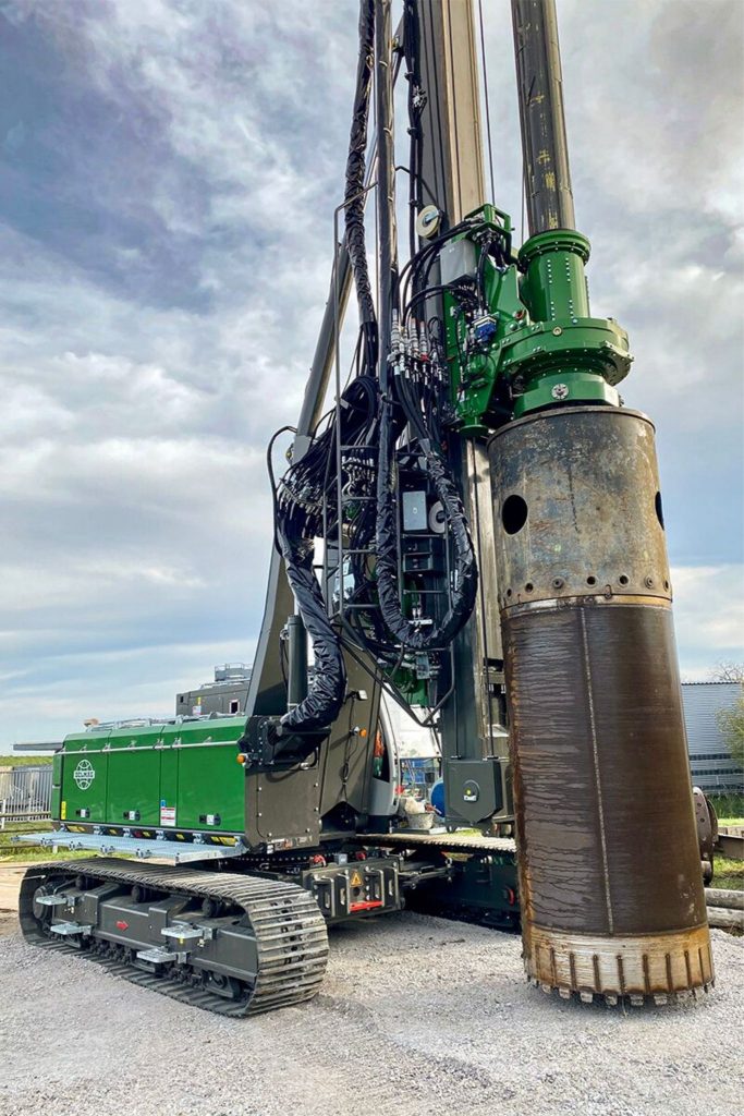 Delmag RH 27 rotary drill rig with large casing attached